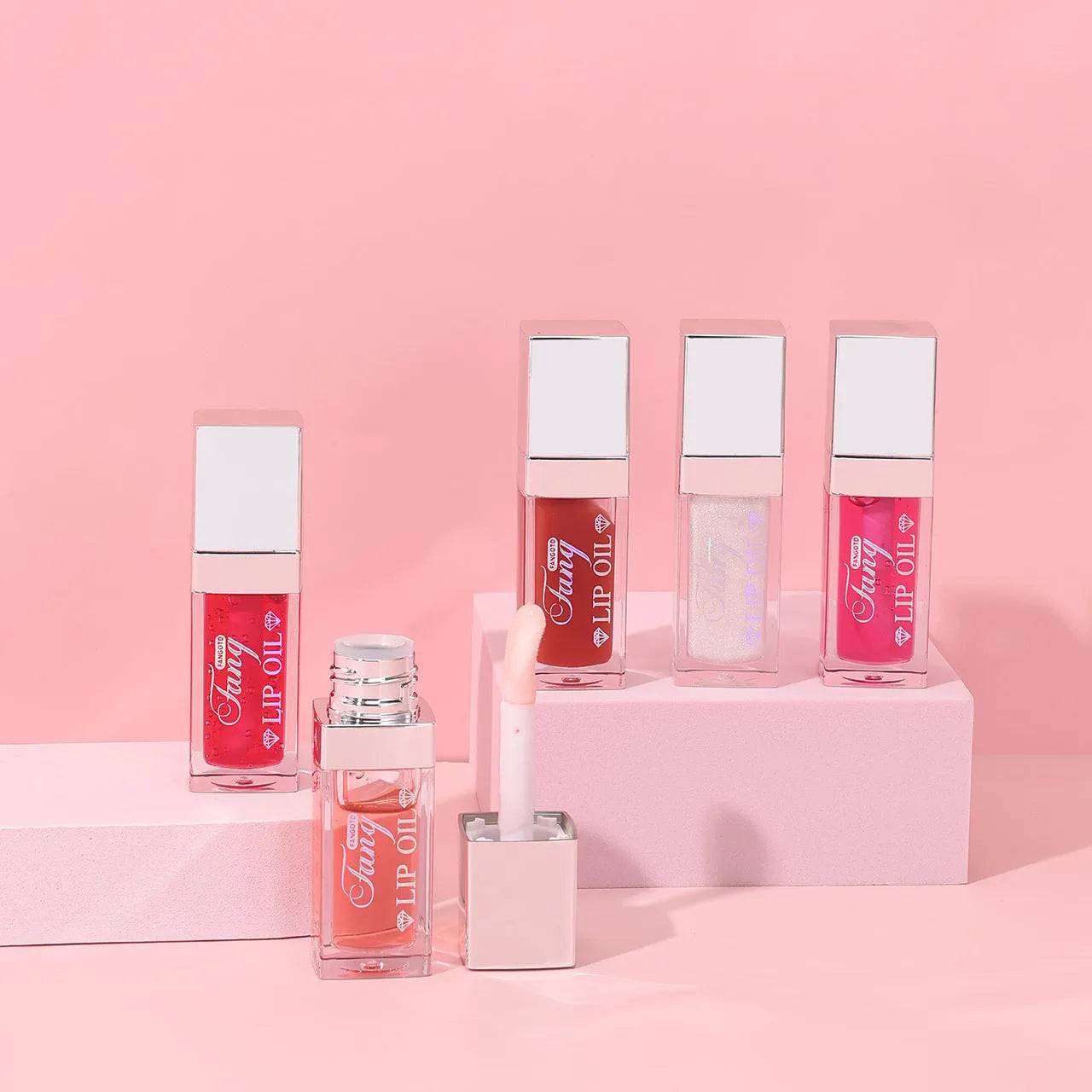 Bright mint lip gloss tube with five colour options showing moisturising and repairing lipstick