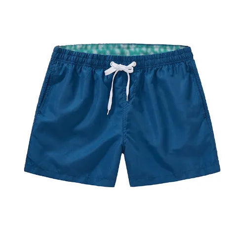 Men's polyester beach shorts in multiple colours with straight leg design for surfing and casual wear