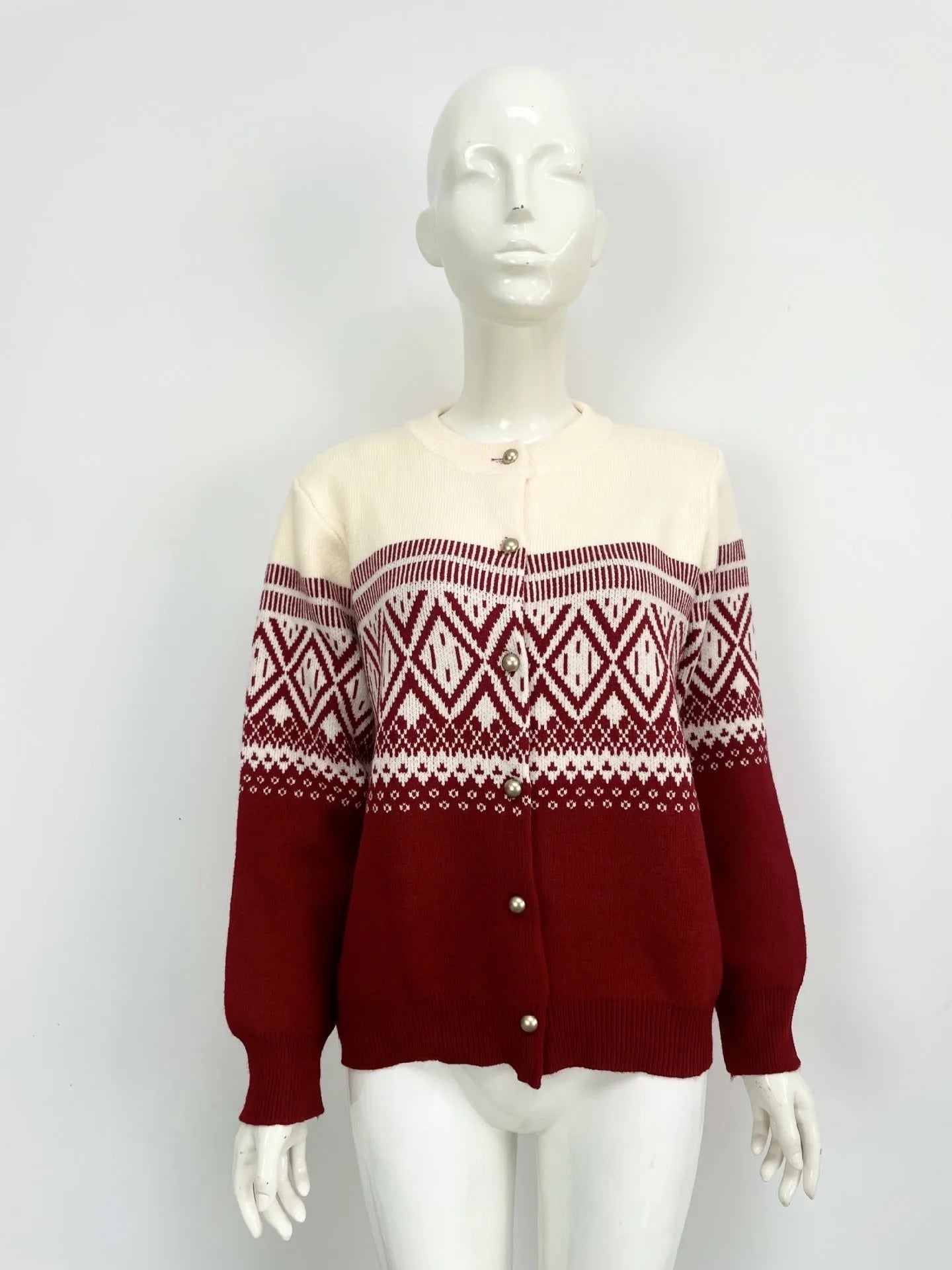 Women's red alpaca wool cardigan with diamond knit pattern and contrast colour detailing