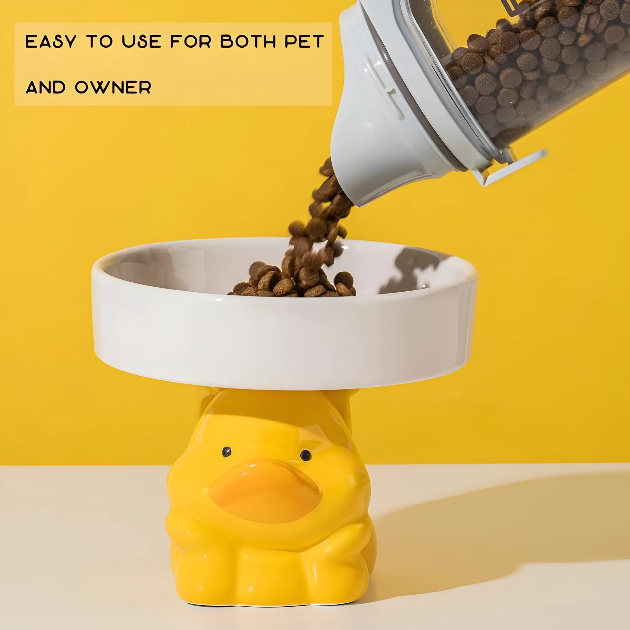 Raised ceramic cat food bowl in animal theme design, showing elevated height and wide bowl.