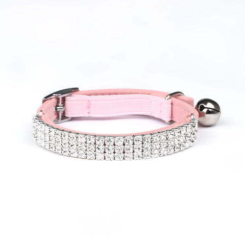 Velvet cat collar with rhinestones, shown in red colour, adjustable from 20 to 30 cm.