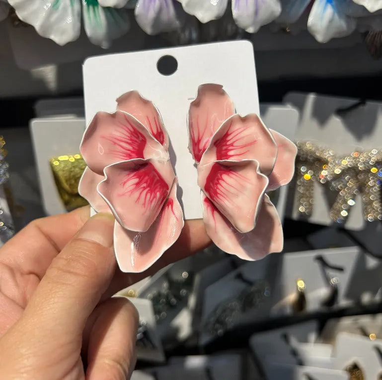 Pastoral style alloy earrings with oil-spot glaze floral designs in four colour options