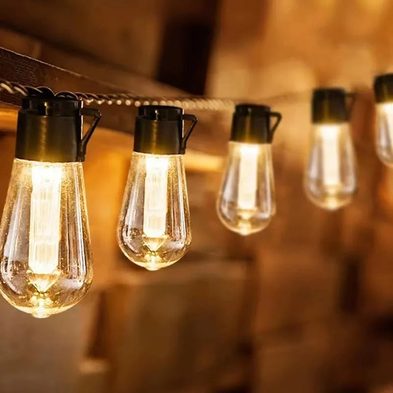 Retro infusion bottle shaped outdoor festoon lights with IP55 rating in earth instrument lighting chain arrangement