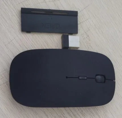 Bluetooth dual-mode wireless mouse with USB receiver and charging cable in grey finish