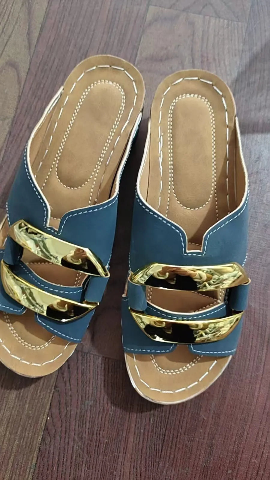 Roman style platform sandals in black, white, khaki, and sea blue colours on a rubber sole.