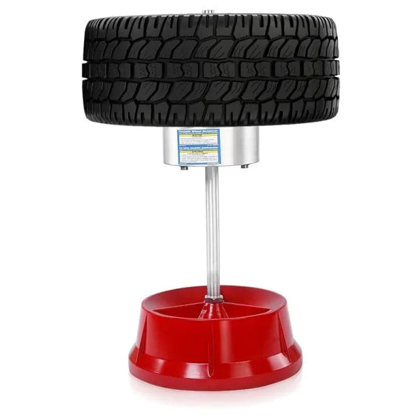 Portable aluminium hub balancer with bull's eye level on a red enamel-finished base.