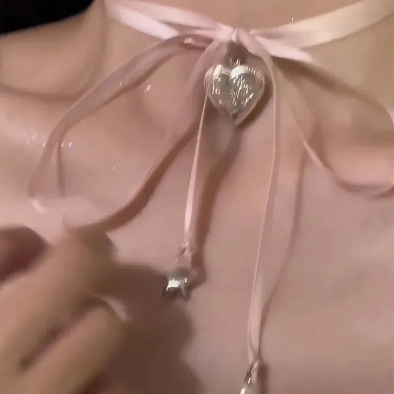 Women's love pendant fashion necklace with ribbon detail on clavicle-length alloy chain