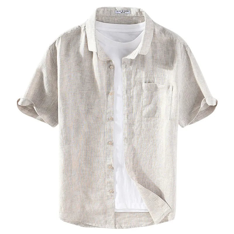 Men's raw jute coloured linen short sleeve shirt with a square collar laid flat.