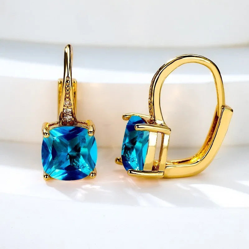 Square geometric zirconia ear hook earrings in a selection of gold, rose gold and platinum plated colours.