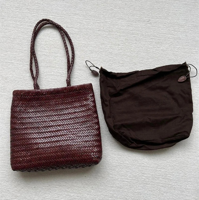 Brown handmade woven leather tote bag with outer pocket