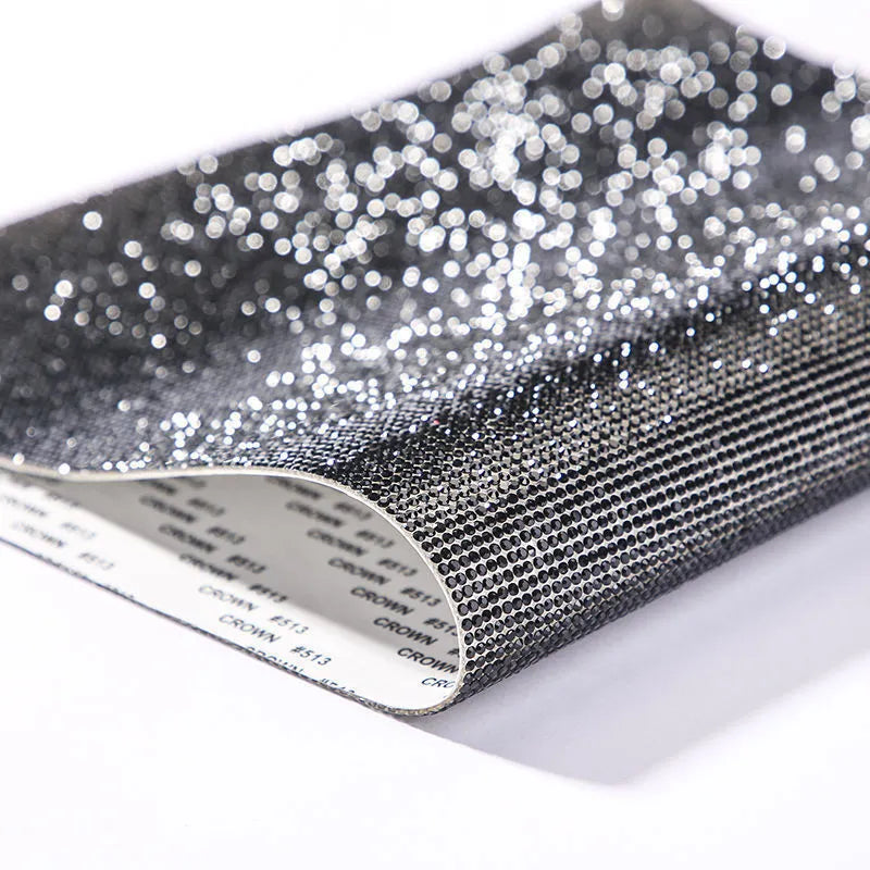 Rhinestone adhesive sheet with eight-eye pattern in multiple colour options on white background
