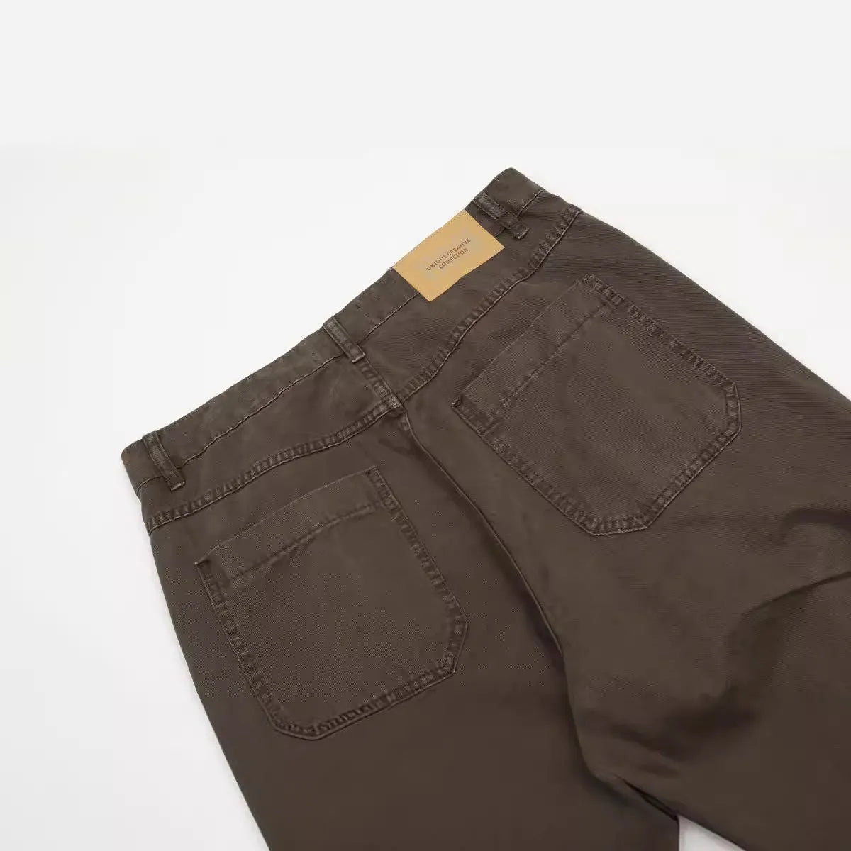 Men's brown loose straight-leg cotton trousers with high waist and zip fly
