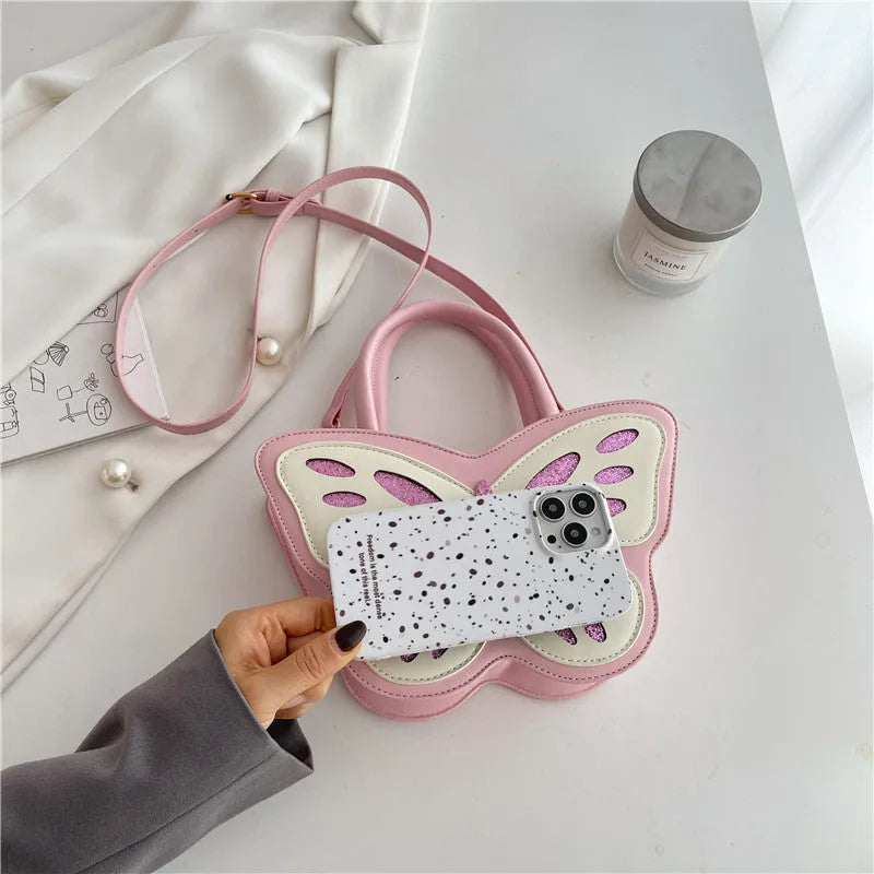 Small square crossbody shoulder bag in white, pink, blue, or black with contrasting colour details