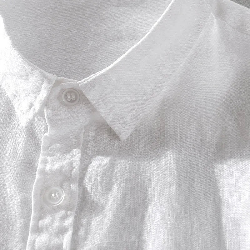 Men's loose fit short sleeve linen shirt in a cotton and linen blend, shown in apricot colour.