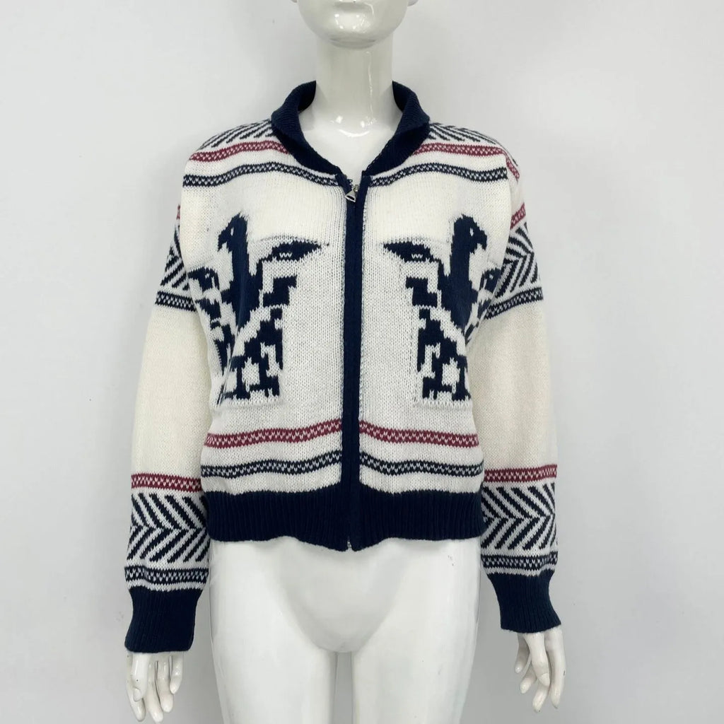 White women's cardigan with a front zip, lapel collar, and jacquard contrast colour striping.