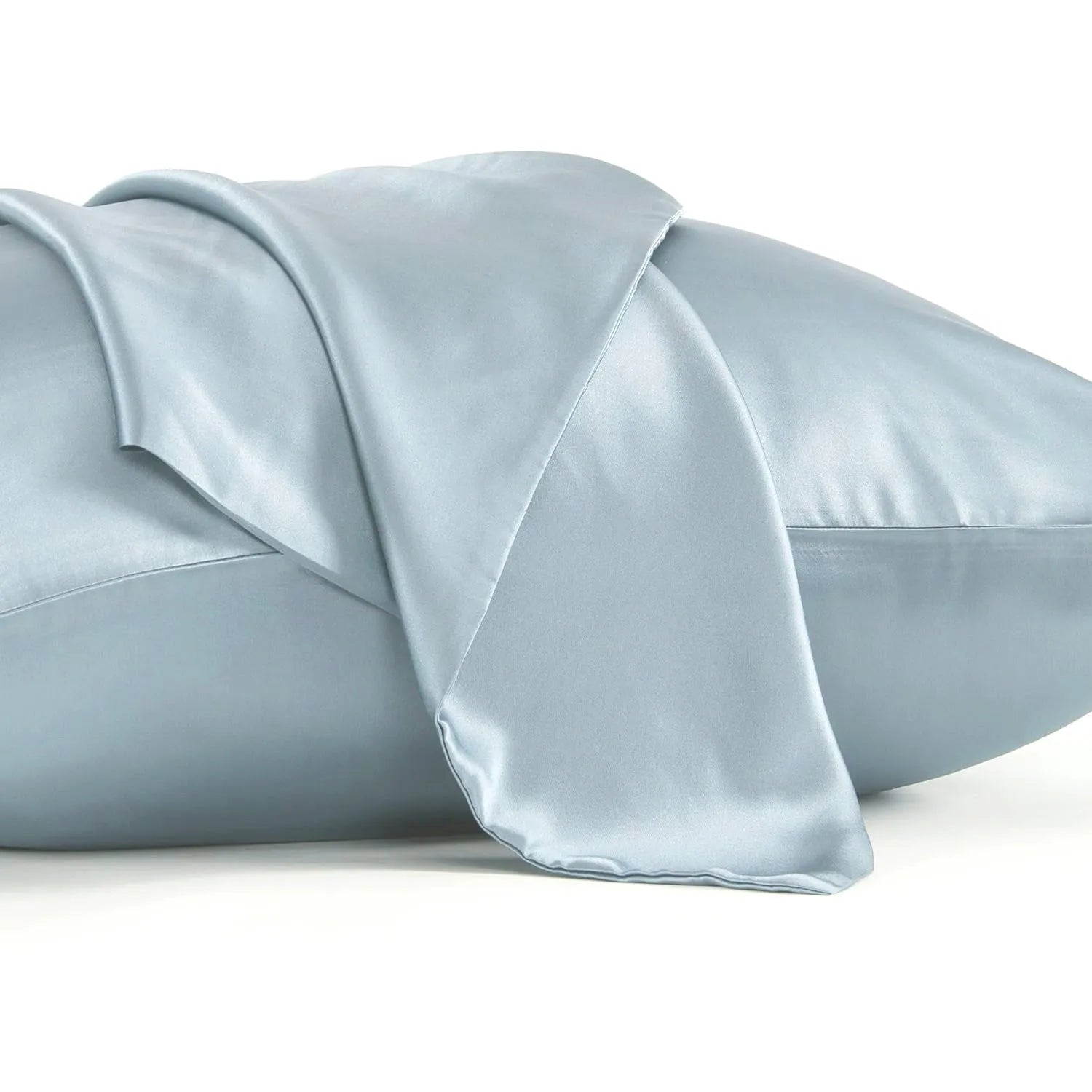 Dark grey envelope closure silk pillowcase on a bed.