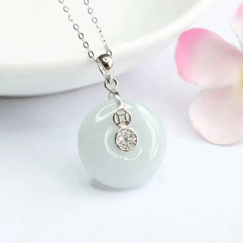 S925 silver inlaid natural emerald round geometric pendant 18x6mm on white background