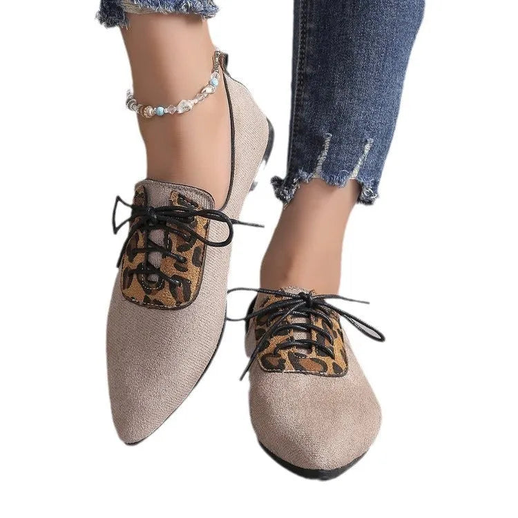 Beige leopard print pointed toe pumps for women with a block heel, shown in a plus size.