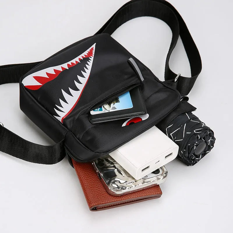 Men's small black crossbody bag with an animal pattern made from oxford cloth.