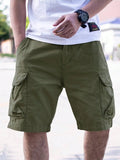 Men's loose fit cotton blend workwear shorts in army green on a mannequin