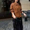 Women's brown polyester suede coat with regular sleeves on hanger