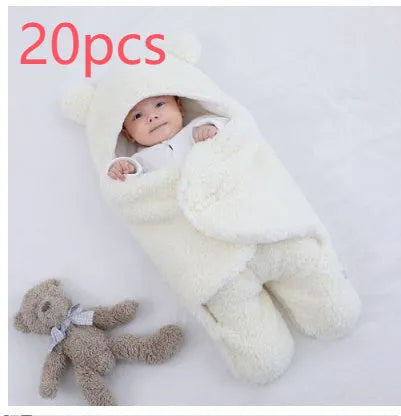 Baby quilted sleeping bag wrapper in cotton blend fabric showing colour options: white, red, grey, light blue, pink, khaki.