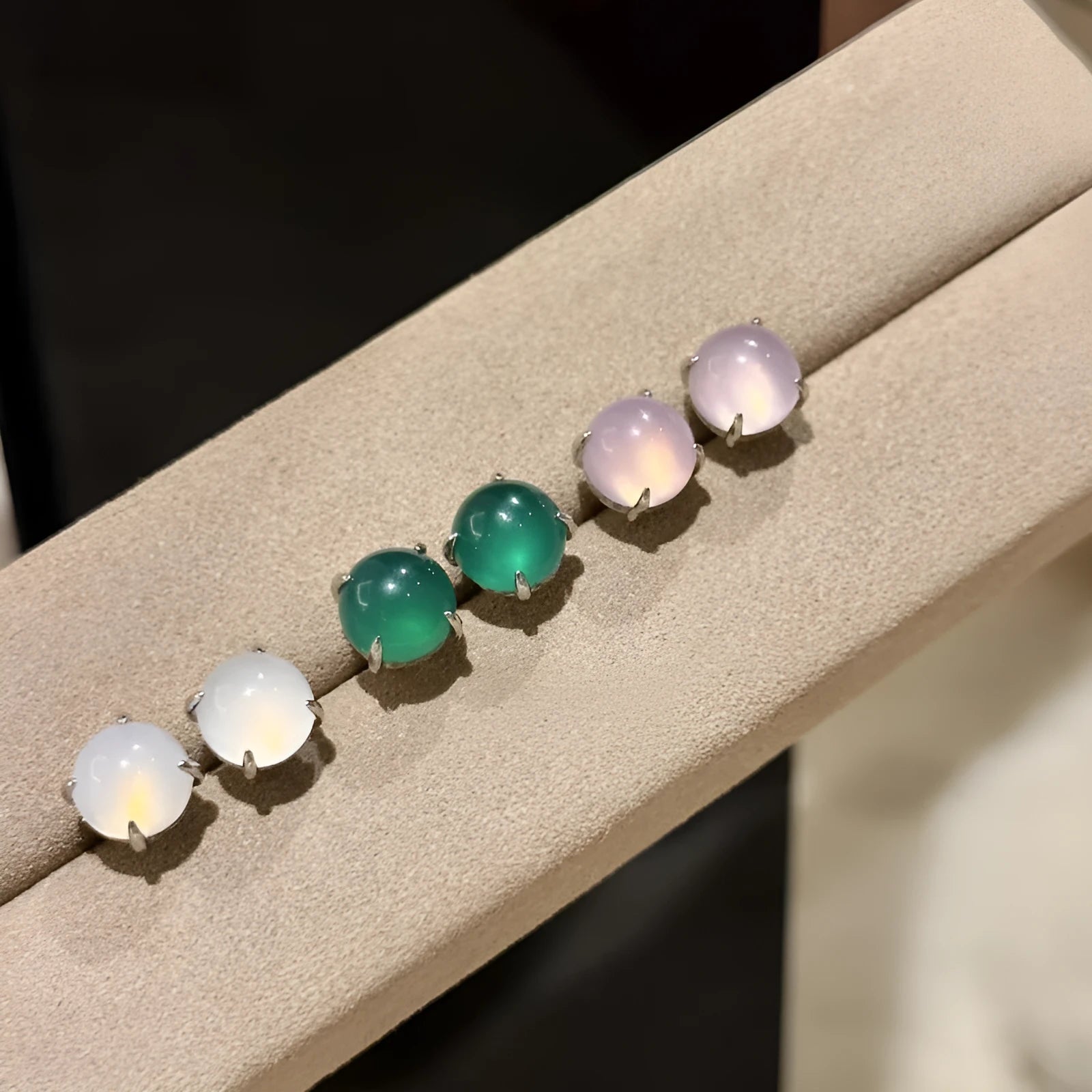 Chinese style chalcedony stud earrings with round egg surface stones in copper four-claw settings