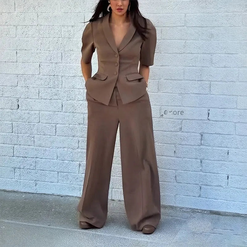 Brown men's two-piece polyester suit set with slim-fit waist, showing long-sleeved top and full-length trousers.