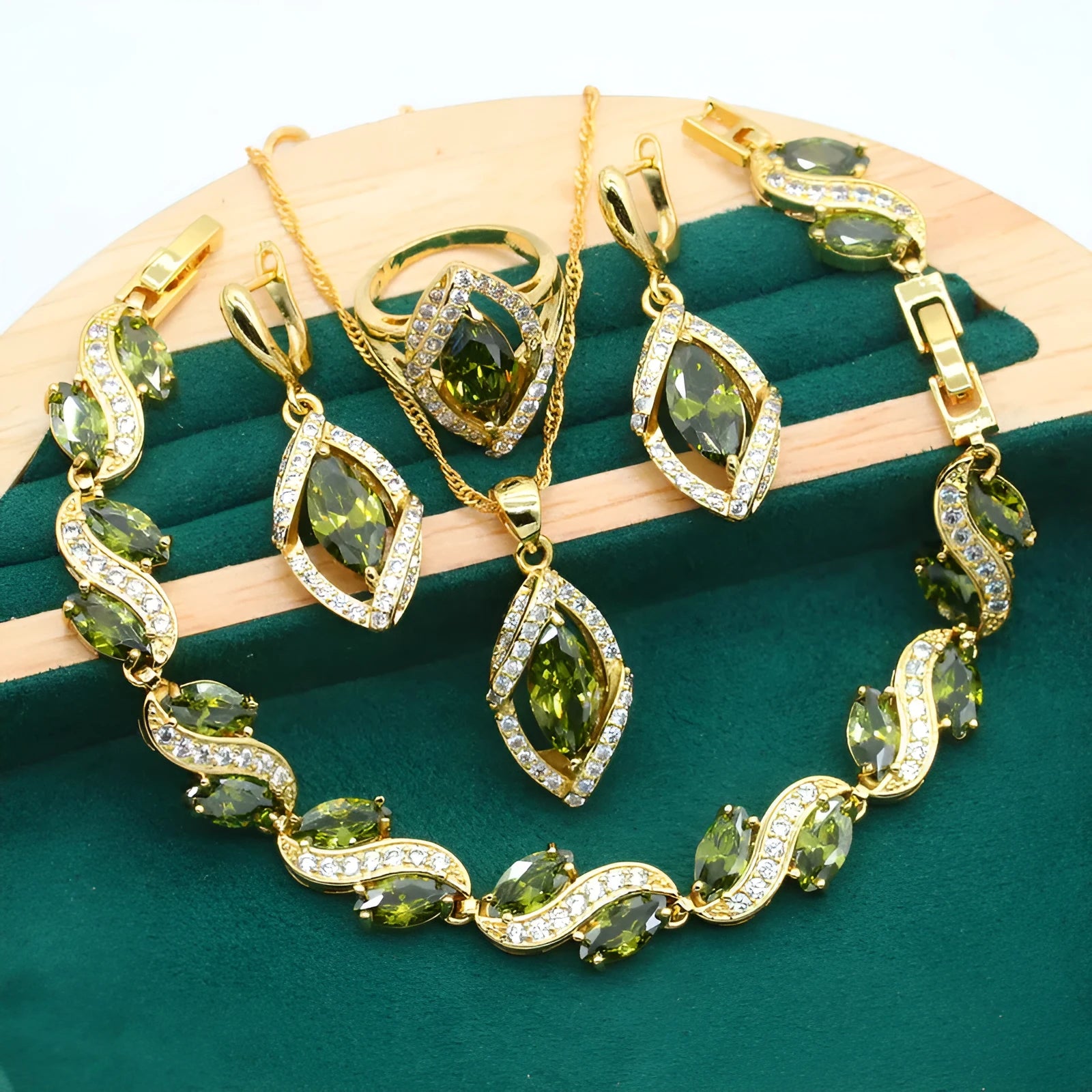 Olive green anti-allergy AAA zircon jewellery set with necklace, ring, bracelet, and earrings on display