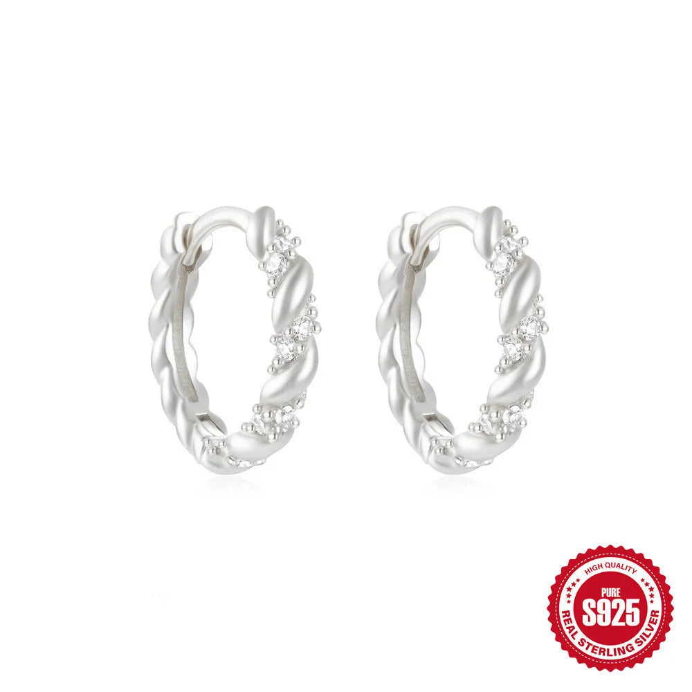 Sterling silver geometric stud earrings with small round diamond accents in gold or silver electroplated finish