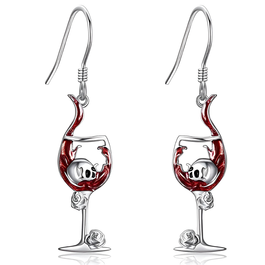 A pair of zinc alloy skull wine glass earrings with an electroplated metallic finish.