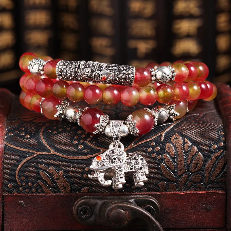 Handmade natural watermelon crystal bracelet with Chinese knot closure in geometric national style design