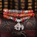Handmade natural watermelon crystal bracelet with Chinese knot closure in geometric national style design