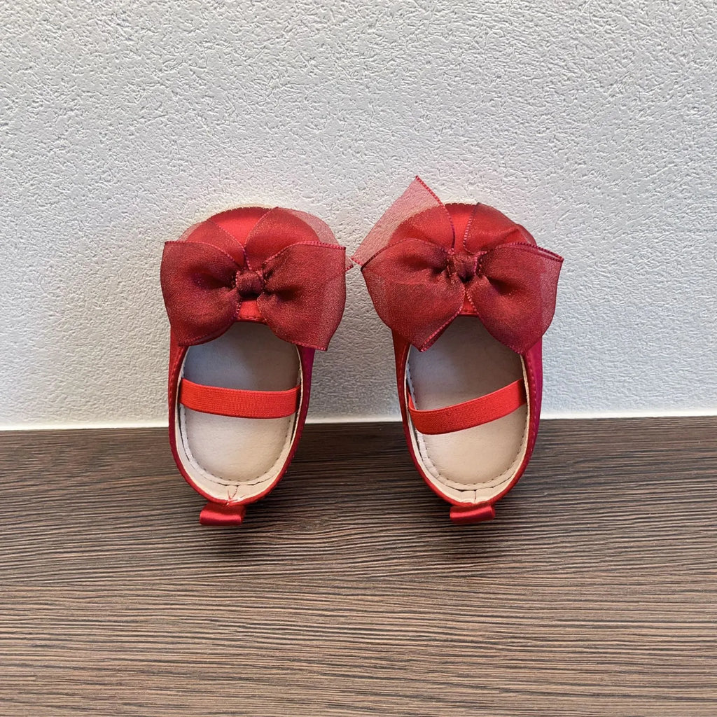 Princess toddler soft bottom pumps in festive red with bow pattern real silk upper elastic band closure