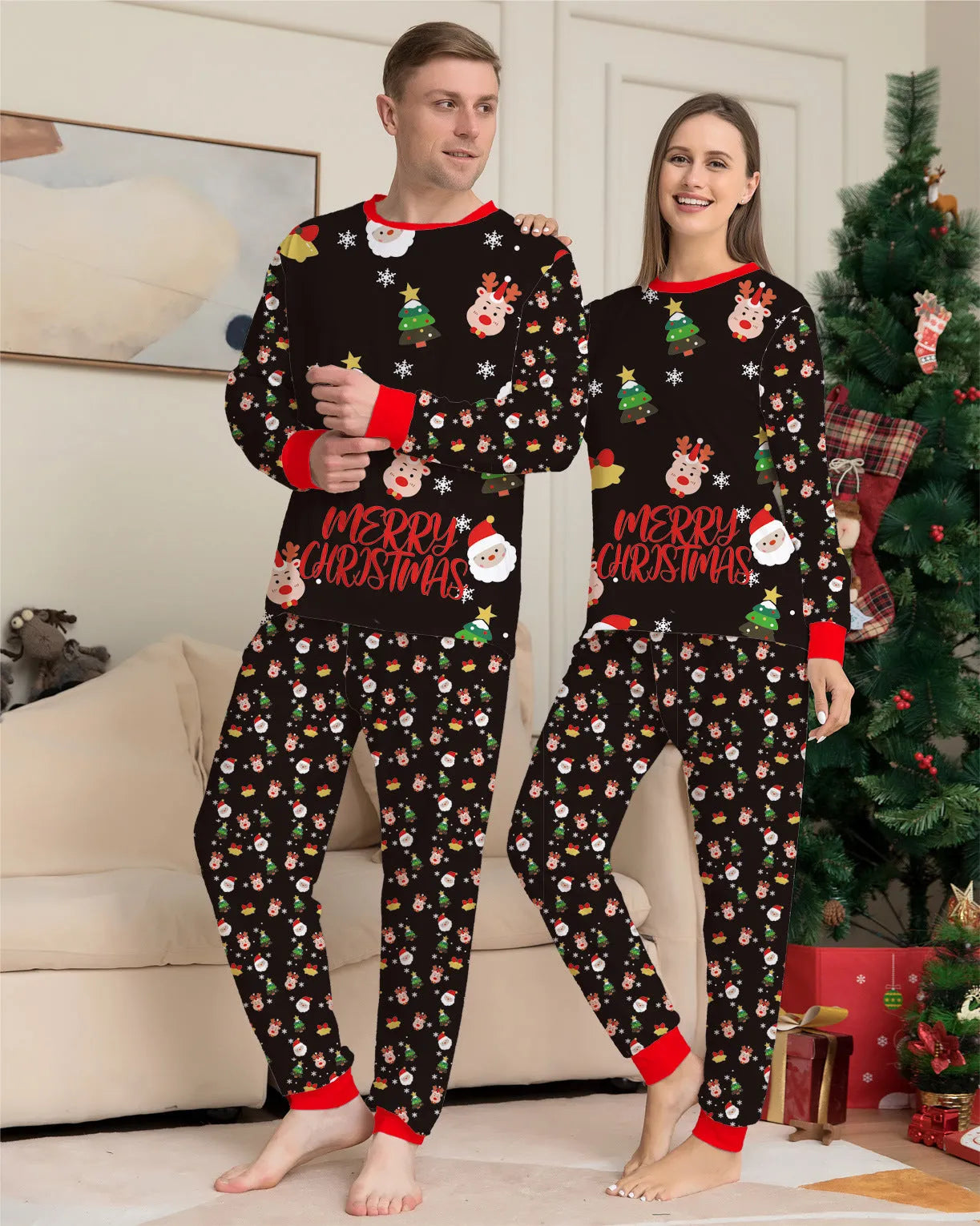 Family wearing matching red plaid Christmas pajamas with dog in matching pet pajamas