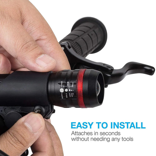 Black bicycle headlight and taillight set with handlebar mounting bracket on a bicycle.