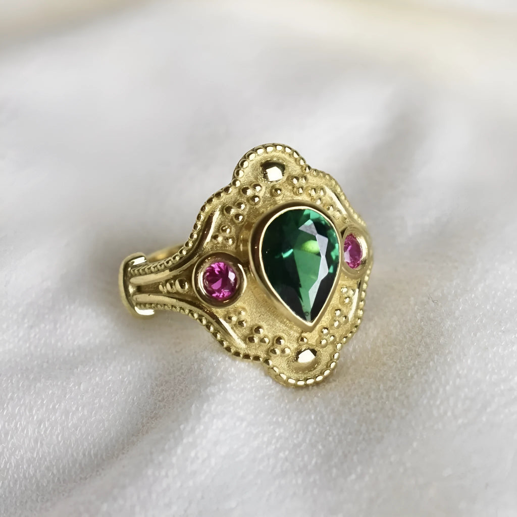 Women's gold-plated geometric ring with electroplated golden lvzuan finish showing side view