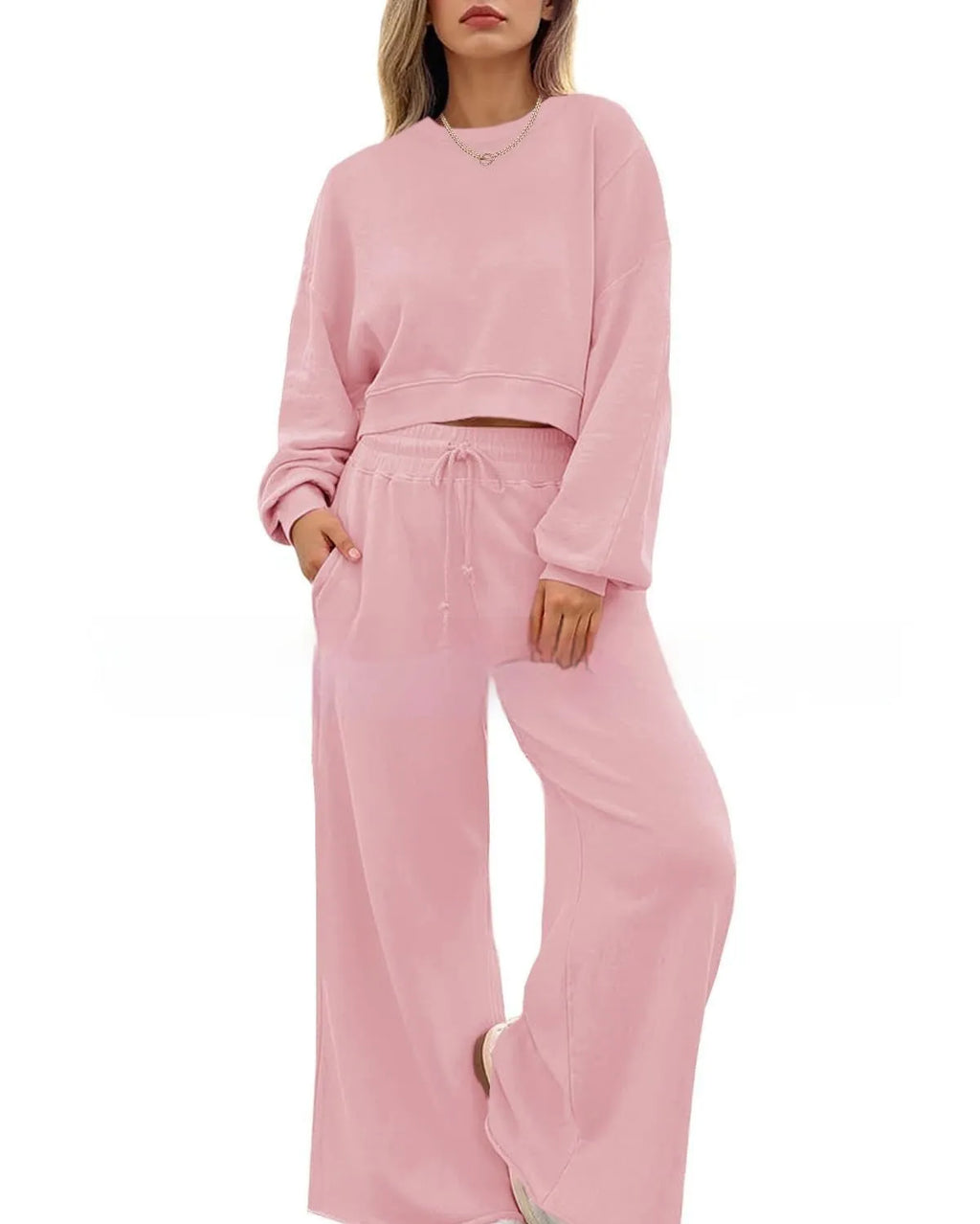 Women's solid colour polyester two-piece casual set with long sleeves and trousers.