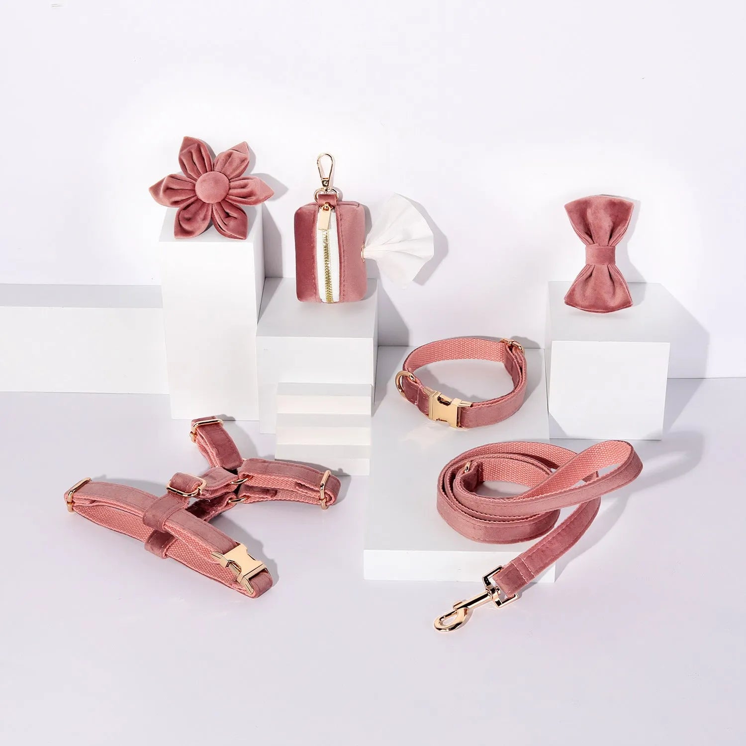 Soft cloth pet harness and lead set in velvet, showing collar, chest strap, lead, bow tie, and flower accessory.