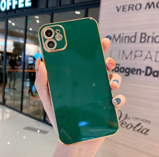 Gold plated electroplated iPhone case with silicone stripes on a tpu body in emerald green colour.