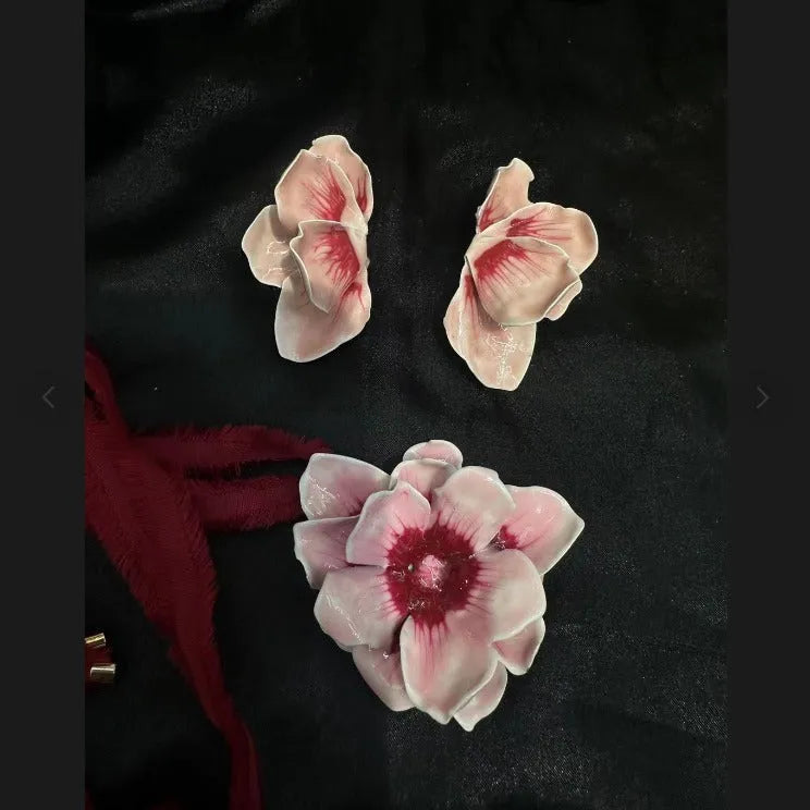 Pastoral style alloy earrings with oil-spot glaze floral designs in four colour options