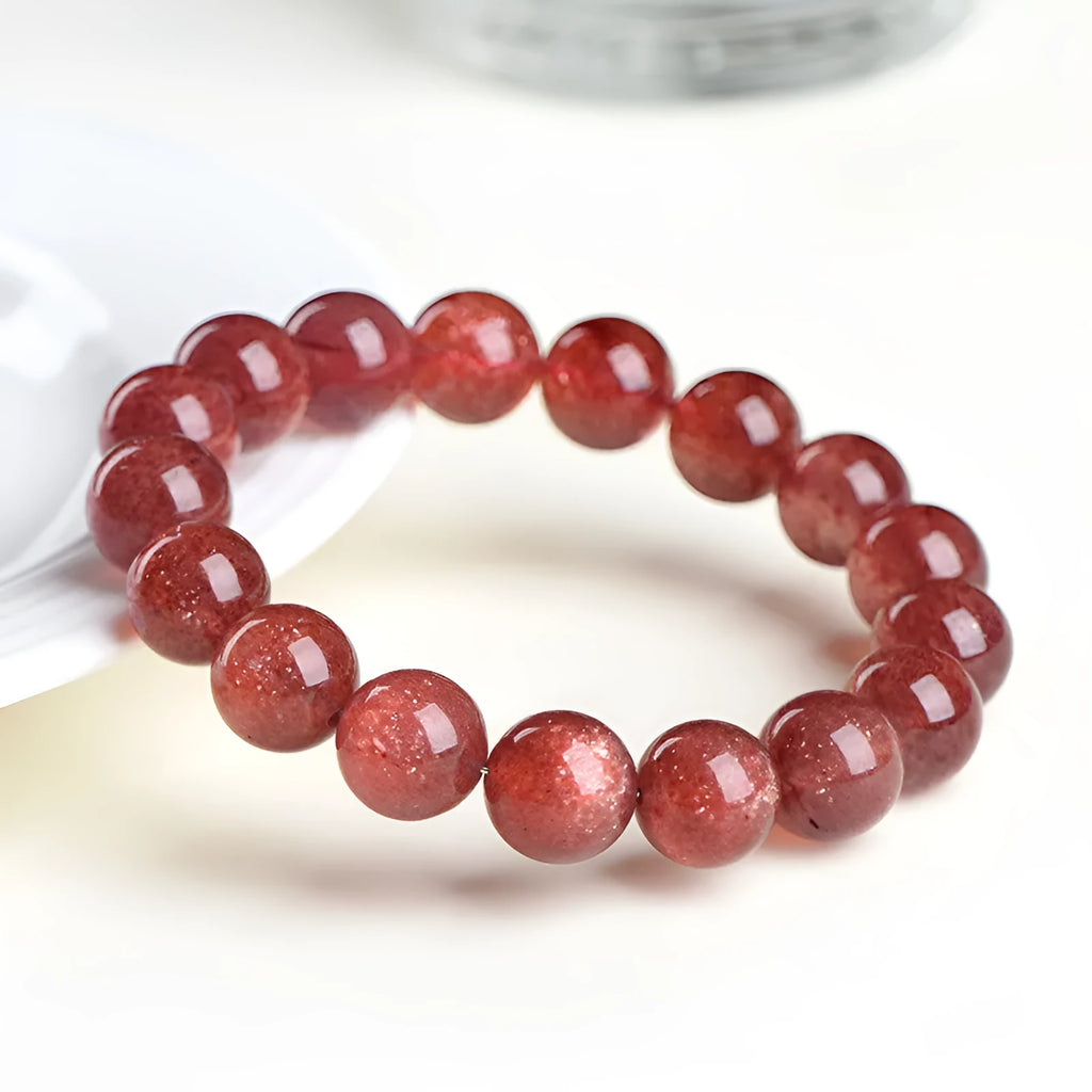 Natural starlight cherry red strawberry quartz bracelet with geometry-shaped beads in crystal material