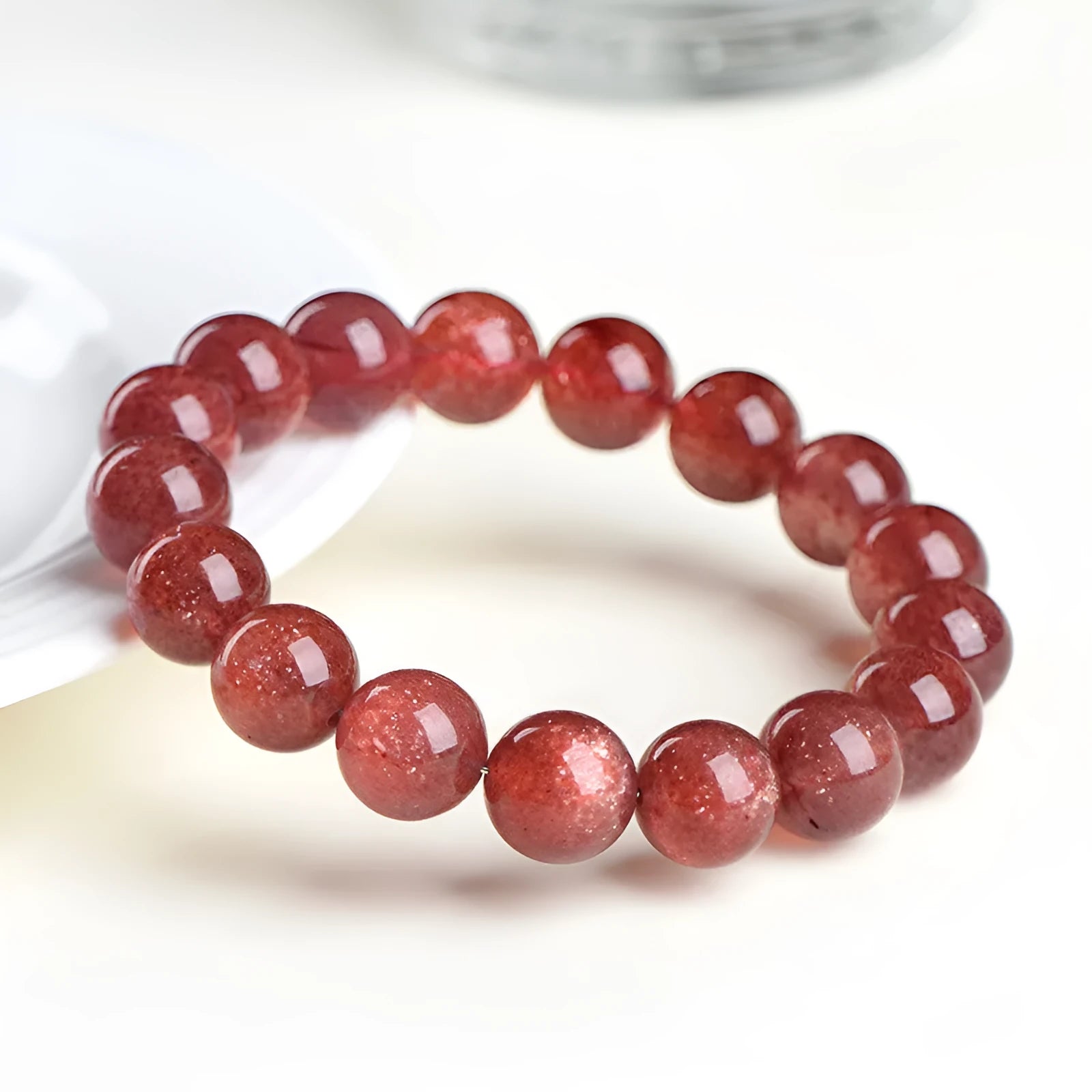Natural starlight cherry red strawberry quartz bracelet with geometry-shaped beads in crystal material
