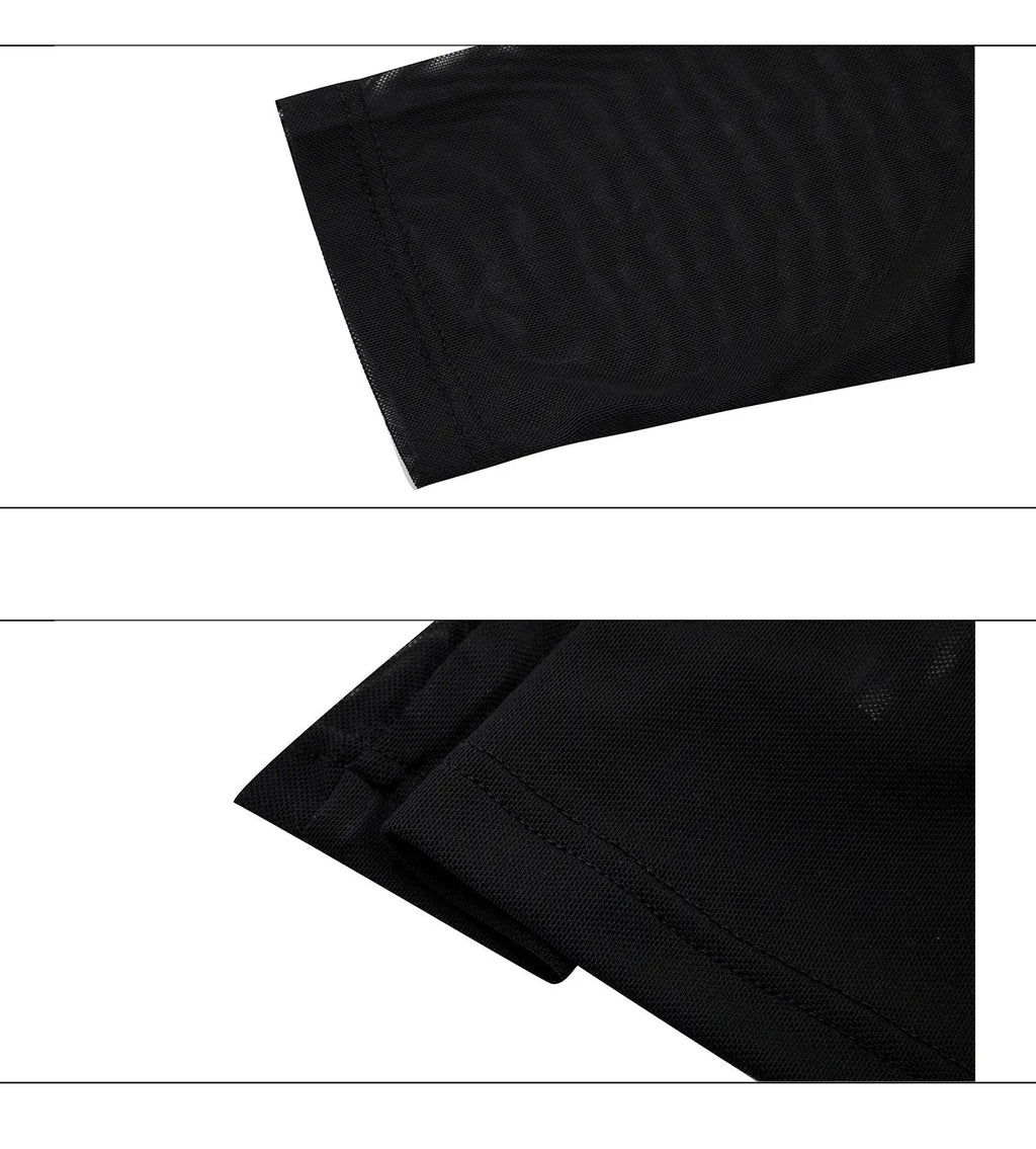 Man wearing a black slim fit long sleeve mesh base layer shirt.