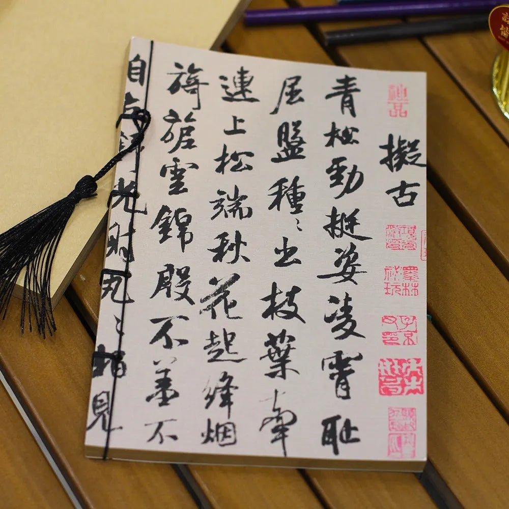 A5 antique wire-bound notebook with retro painting design on white cowhide cover