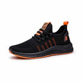 Men's low-top black casual sports shoes with cross strap detail and Flying Weave upper on a wear-resistant sole.