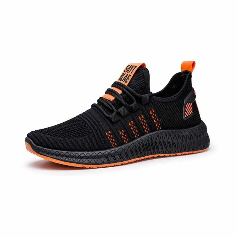 Men's low-top black casual sports shoes with cross strap detail and Flying Weave upper on a wear-resistant sole.