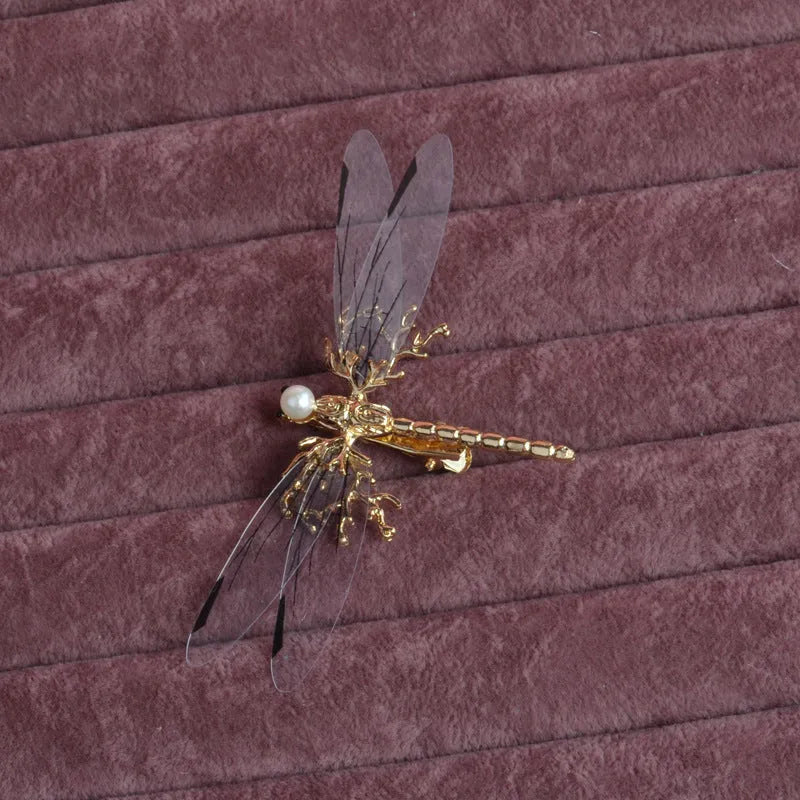 Golden electroplated dragonfly side clip headdress for women with detailed insect design