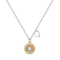Sterling silver sunflower necklace with geometric daisy petal pendant on an adjustable cross chain.