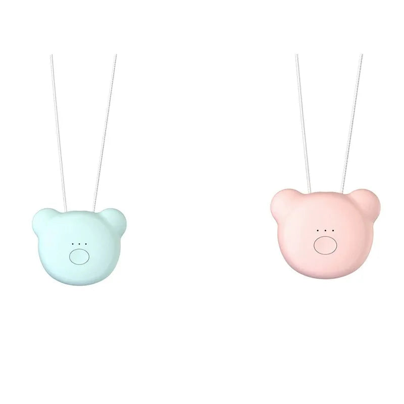 Mini USB portable air purifier necklace in pink, showing compact wearable design.